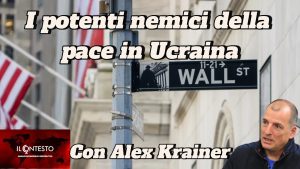 Un'insegna di Wall Street appare mentre il testo italiano parla della guerra russo-ucraina e delle opinioni di Alex Krainer sulla pace.